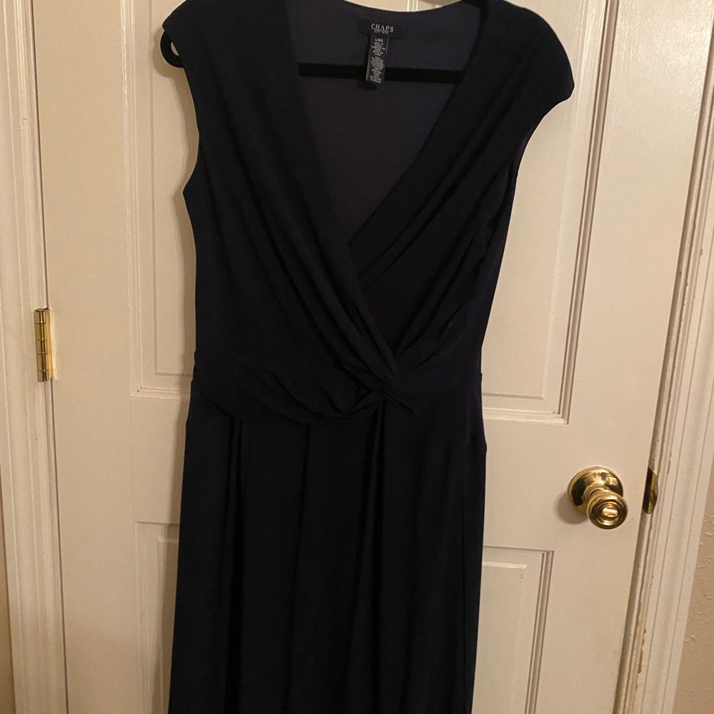 Chaps. Navy dress.